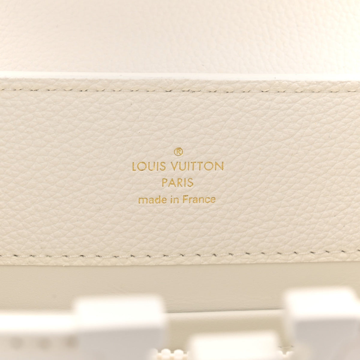 Taurillon Capucines East West MM Optic White